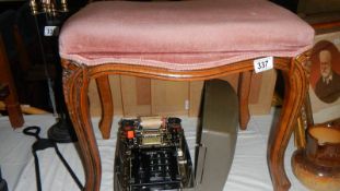 A mahogany cabriole leg stool.