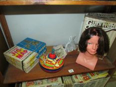 A boxed vintage girls world make-up and styling head,