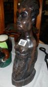 A carved wood African figure,