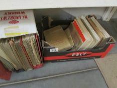 A box of books and manuals relating to the fire brigade.