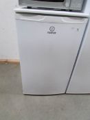 An Indesit fridge.