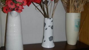 3 vases with artificial flowers,