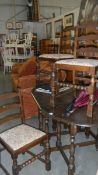 An oak drop leaf table and 4 ladderback chairs,