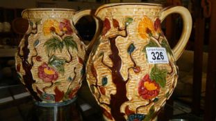 A pair of H J Wood Indian Tree pattern jugs,