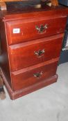 A mahogany 3 drawer bedside cabinet,