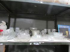 A shelf of glass ware.