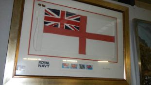 A framed and glazed Royal Navy ensign.