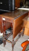 A small inlaid drop leaf table,.