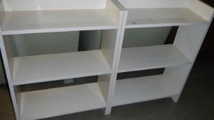 A pair of painted book cases,