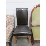 A black 'leatherette' chair.