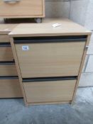 A 2 drawer filing cabinet.