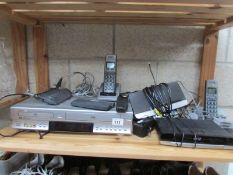 A Toshiba DVD/video player, telephones etc.