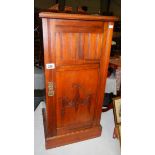 A mahogany pot cupboard.