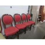 A set of 4 mahogany framed chairs with brocade upholstery.