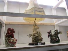 A figural table lamp and 2 dragon lamps (slight a/f)