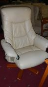 A cream leather chair,