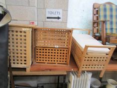 A matching linen bin, table and stool.