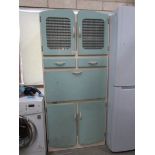 A mid 20th century kitchen cabinet,