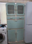 A mid 20th century kitchen cabinet,