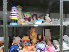 2 shelves of soft toys etc.