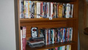 2 shelves of DVD's etc.
