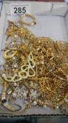 A mixed lot of yellow metal jewellery, chains etc.