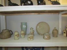 9 pieces of Masham pottery including cruet set.