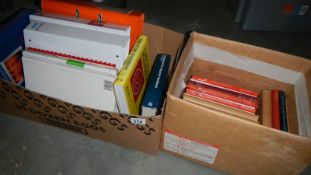 2 boxes of books and handbooks on fire protection and fire safety.