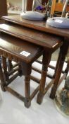 A nest of 3 oak tables,.