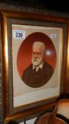 A framed and glazed portrait print of Victor Hugo.