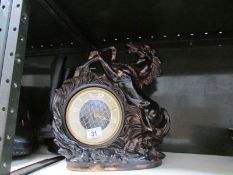 a 1950/60's German pottery figural clock.