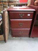 A 3 drawer bedside chest.