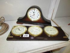 A mantel clock and a barometer,