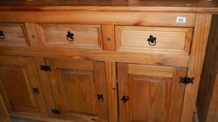 A pine sideboard,.