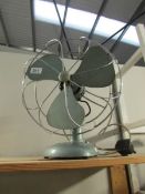 A vintage desk fan.