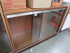 A sliding door cabinet.