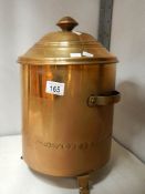 An Edwardian brass coal bucket.