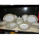 A quantity of Delhi Addersley Ltd plates and a set of William Adams teaspoons.