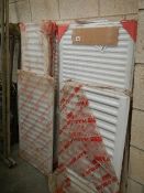 A large quantity of mainly unused radiators.