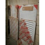 A large quantity of mainly unused radiators.