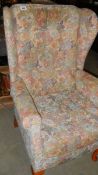 A wing arm chair,