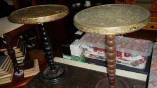 2 brass topped tables,.