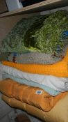 A quantity of quilts and blankets,