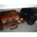 A small vintage suitcase and 2 briefcases,