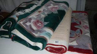 A quantity of wool rugs.