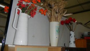 3 vases including artificial flowers.