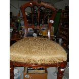 A mahogany dining chair,