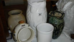 4 vases and a salt jar.
