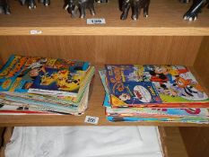 A quantity of Disney comics etc.