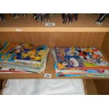 A quantity of Disney comics etc.